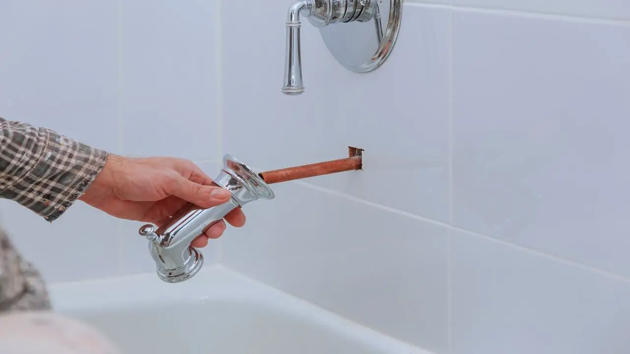 Remove Any Fixtures Attached To The Bathtub
