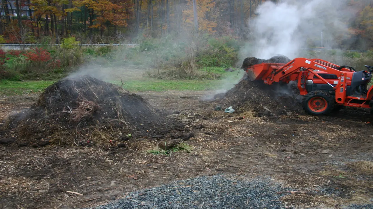 Turning The Compost Pile